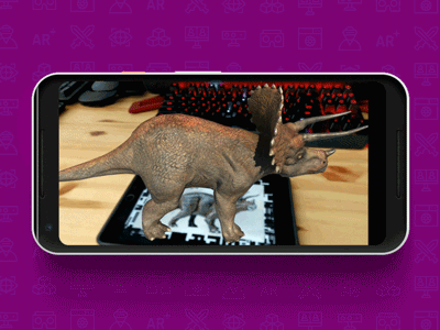 Demonstration of augmented reality dinosaur appearing when scanning a special card